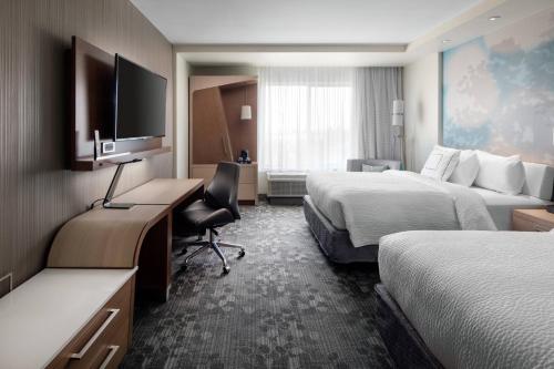 Imagen de la habitación del Hotel Courtyard By Marriott Pullman. Foto 13