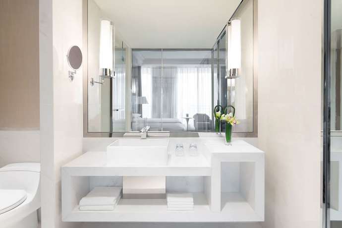 Imagen de la habitación del Hotel Courtyard By Marriott Shanghai Changfeng Park. Foto 13