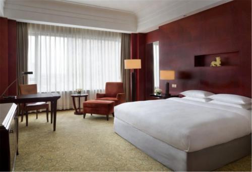 Imagen de la habitación del Hotel Courtyard By Marriott Shanghai Fengxian. Foto 10