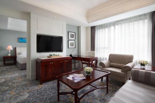 Imagen de la habitación del Hotel Courtyard By Marriott Shanghai Fengxian. Foto 12
