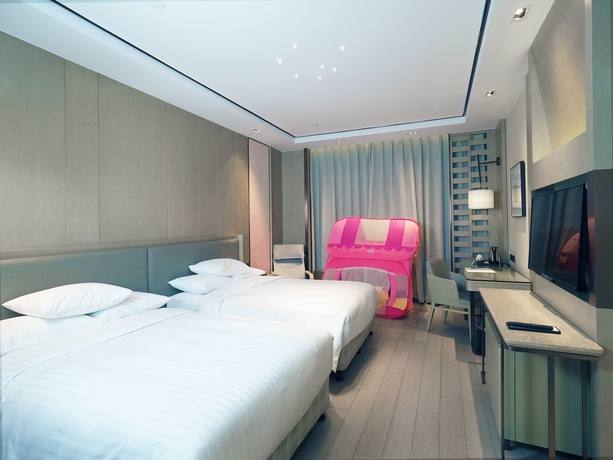 Imagen de la habitación del Hotel Courtyard By Marriott Shanghai International Tourism and Resorts Zone. Foto 9