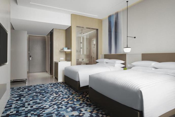 Imagen de la habitación del Hotel Courtyard By Marriott Shanghai Minhang. Foto 8