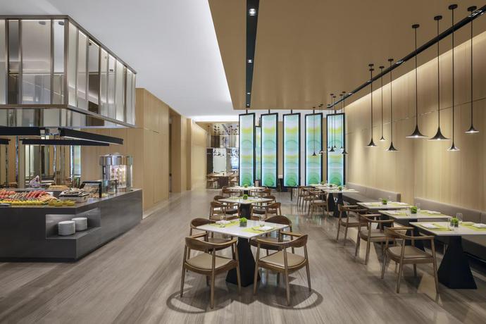Imagen del bar/restaurante del Hotel Courtyard By Marriott Shanghai Minhang. Foto 3