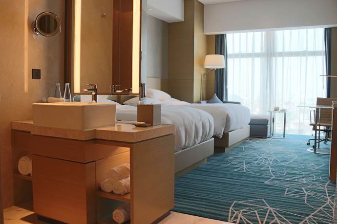 Imagen de la habitación del Hotel Courtyard By Marriott Shunde Longjiang. Foto 3