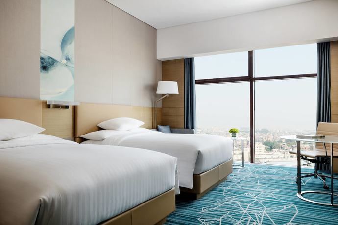 Imagen de la habitación del Hotel Courtyard By Marriott Shunde Longjiang. Foto 6