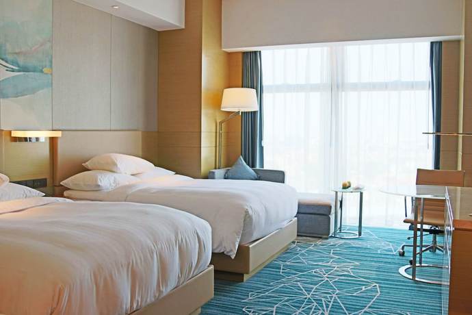 Imagen de la habitación del Hotel Courtyard By Marriott Shunde Longjiang. Foto 10