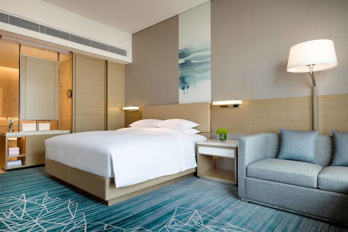 Imagen de la habitación del Hotel Courtyard By Marriott Shunde Longjiang. Foto 15