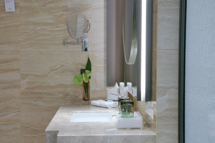 Imagen de la habitación del Hotel Courtyard By Marriott Suzhou Mudu. Foto 6