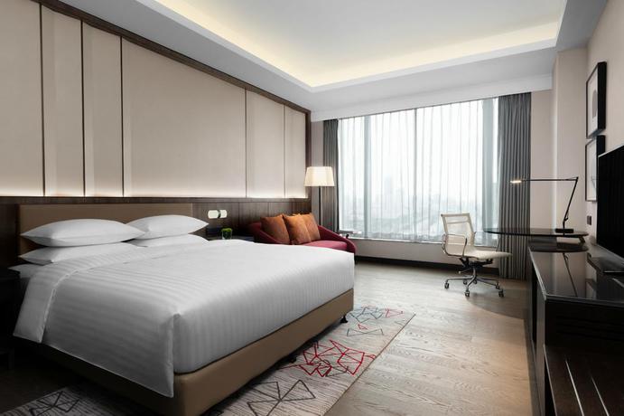 Imagen de la habitación del Hotel Courtyard By Marriott Suzhou Mudu. Foto 7