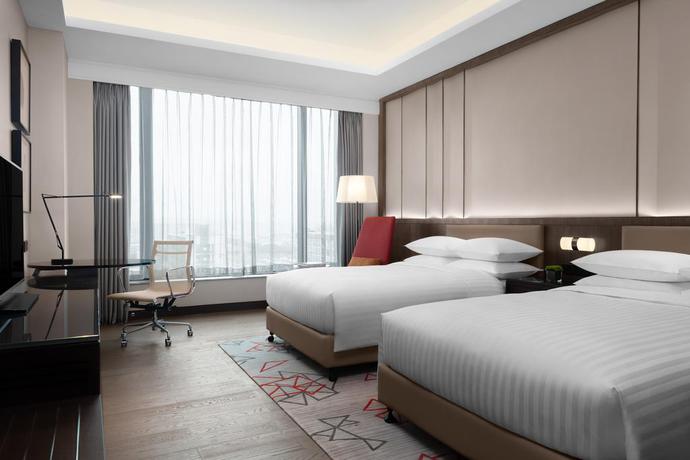Imagen de la habitación del Hotel Courtyard By Marriott Suzhou Mudu. Foto 9