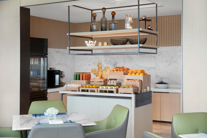 Imagen del bar/restaurante del Hotel Courtyard By Marriott Suzhou Mudu. Foto 3