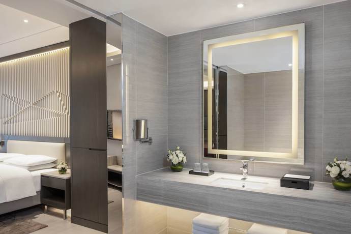 Imagen de la habitación del Hotel Courtyard By Marriott Tianjin Hongqiao. Foto 10