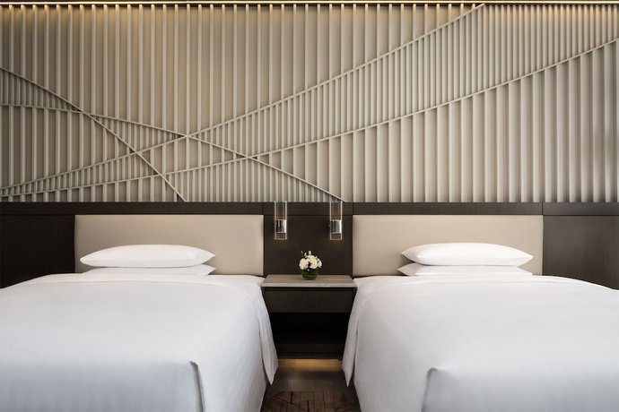 Imagen de la habitación del Hotel Courtyard By Marriott Tianjin Hongqiao. Foto 12