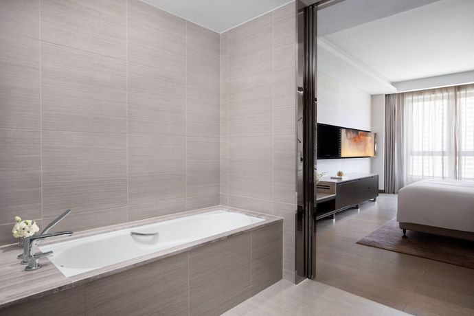 Imagen de la habitación del Hotel Courtyard By Marriott Tianjin Hongqiao. Foto 13