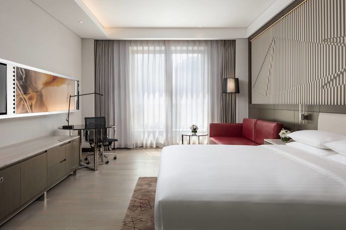 Imagen de la habitación del Hotel Courtyard By Marriott Tianjin Hongqiao. Foto 16