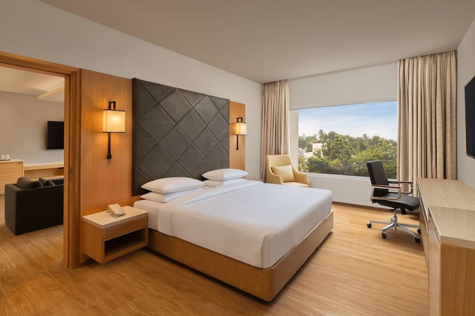 Imagen de la habitación del Hotel Courtyard By Marriott Tiruchirappalli. Foto 6