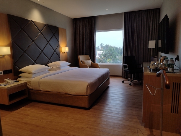 Imagen de la habitación del Hotel Courtyard By Marriott Tiruchirappalli. Foto 7