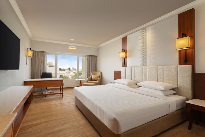 Imagen de la habitación del Hotel Courtyard By Marriott Tiruchirappalli. Foto 11