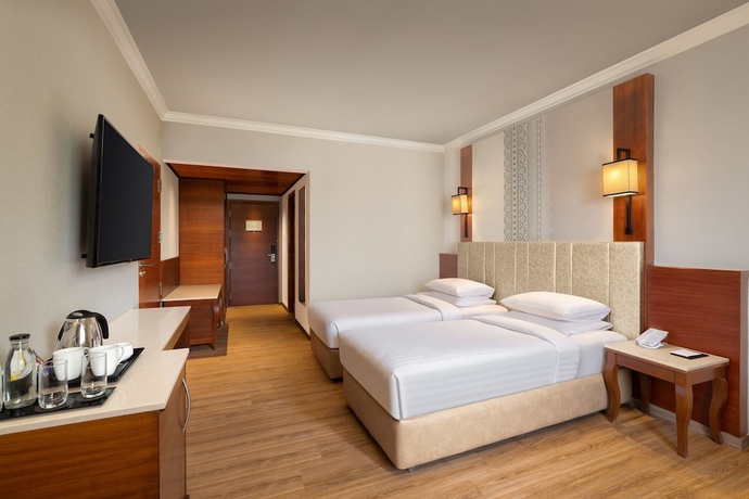 Imagen de la habitación del Hotel Courtyard By Marriott Tiruchirappalli. Foto 15