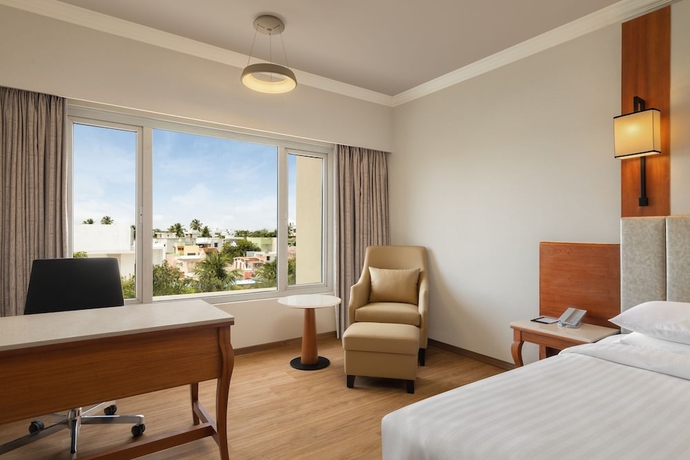 Imagen de la habitación del Hotel Courtyard By Marriott Tiruchirappalli. Foto 16