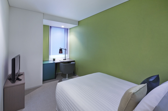 Imagen de la habitación del Hotel Courtyard By Marriott Tokyo Station. Foto 8
