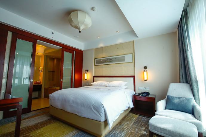 Imagen de la habitación del Hotel Courtyard By Marriott Wuxi Lihu Lake. Foto 3