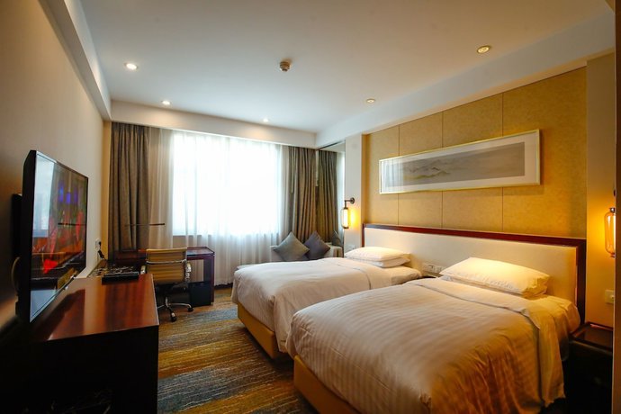 Imagen de la habitación del Hotel Courtyard By Marriott Wuxi Lihu Lake. Foto 4