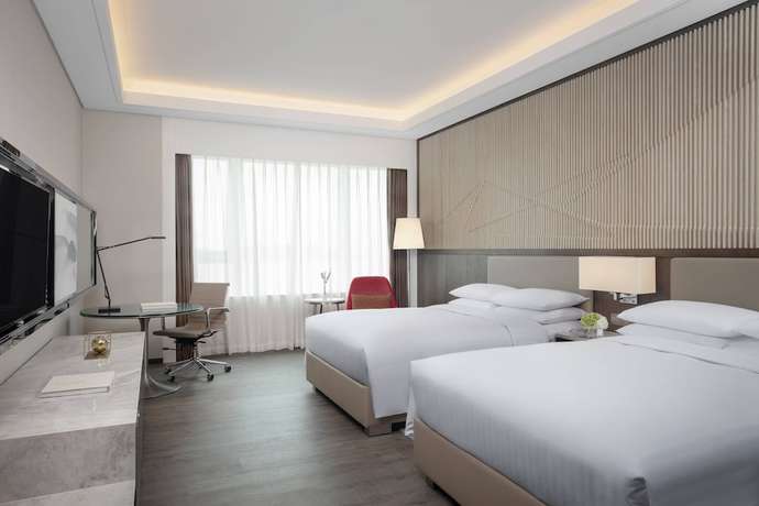 Imagen de la habitación del Hotel Courtyard By Marriott Xiamen Haicang. Foto 9