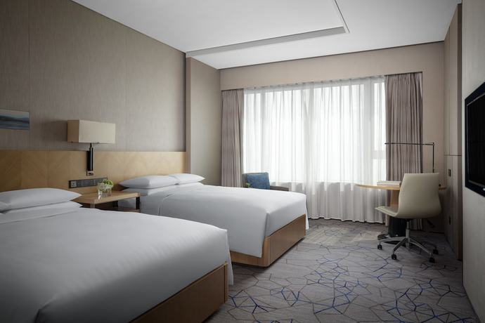 Imagen de la habitación del Hotel Courtyard By Marriott Xiamen Haicang. Foto 11