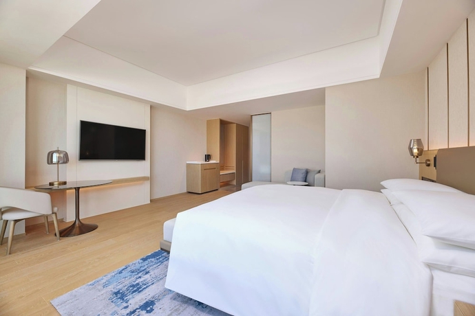 Imagen de la habitación del Hotel Courtyard By Marriott Xiamen Xiang'An. Foto 16
