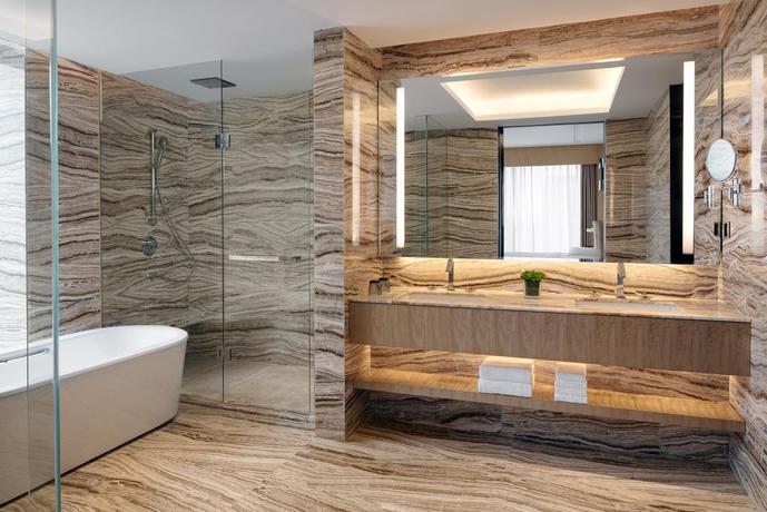 Imagen de la habitación del Hotel Courtyard By Marriott Zhengzhou Airport. Foto 4