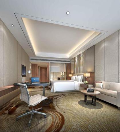 Imagen de la habitación del Hotel Courtyard By Marriott Zhengzhou East. Foto 7