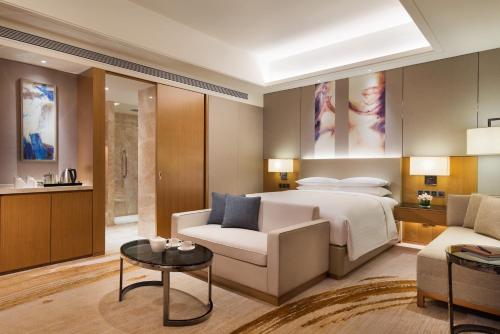 Imagen de la habitación del Hotel Courtyard By Marriott Zhengzhou East. Foto 9