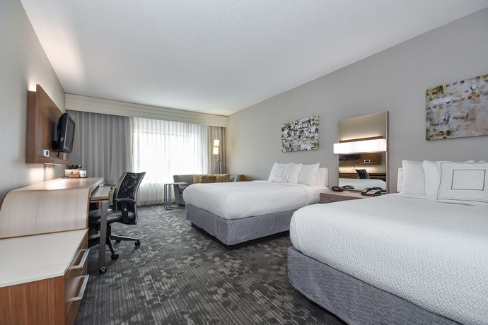 Imagen de la habitación del Hotel Courtyard Charlotte Matthews. Foto 17