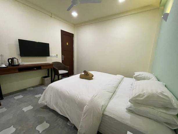 Imagen de la habitación del Hotel Courtyard Guesthouse. Foto 6