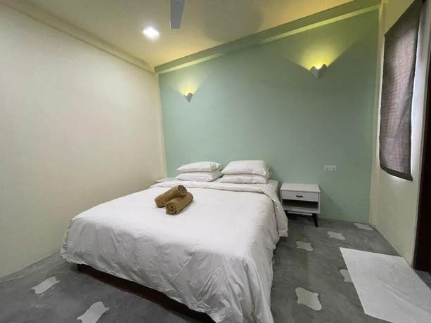 Imagen de la habitación del Hotel Courtyard Guesthouse. Foto 7