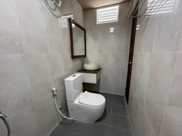 Imagen de la habitación del Hotel Courtyard Guesthouse. Foto 8