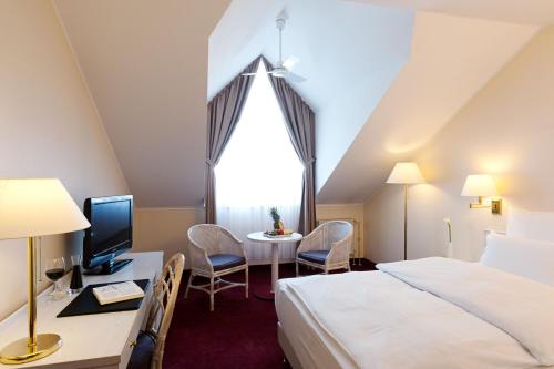 Imagen de la habitación del Hotel Courtyard Magdeburg. Foto 20