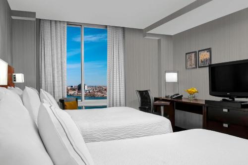 Imagen de la habitación del Hotel Courtyard Marriott Upper East Side. Foto 12