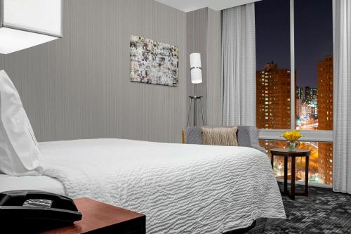 Imagen de la habitación del Hotel Courtyard Marriott Upper East Side. Foto 13