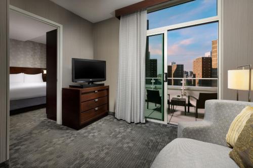 Imagen de la habitación del Hotel Courtyard Marriott Upper East Side. Foto 18