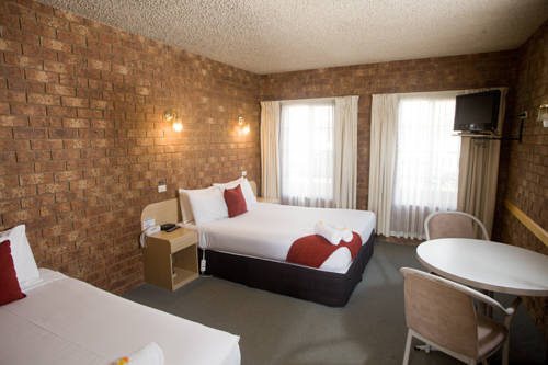 Imagen de la habitación del Hotel Courtyard Motor Inn. Foto 1