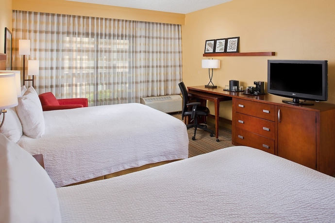 Imagen de la habitación del Hotel Courtyard Orlando Airport. Foto 12