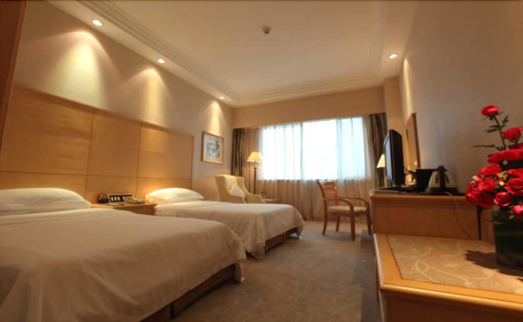 Imagen de la habitación del Hotel Courtyard Yangzhou. Foto 8