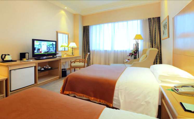 Imagen de la habitación del Hotel Courtyard Yangzhou. Foto 13
