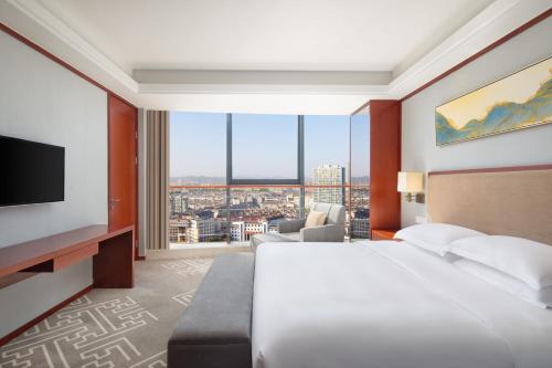 Imagen de la habitación del Hotel Courtyard by Marriott Anji. Foto 12