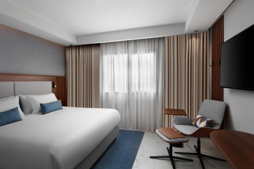 Imagen de la habitación del Hotel Courtyard by Marriott Casablanca Downtown. Foto 20