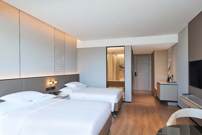 Imagen de la habitación del Hotel Courtyard by Marriott Changchun. Foto 8