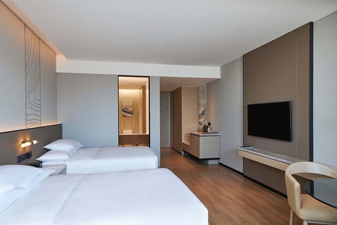 Imagen de la habitación del Hotel Courtyard by Marriott Changchun. Foto 9