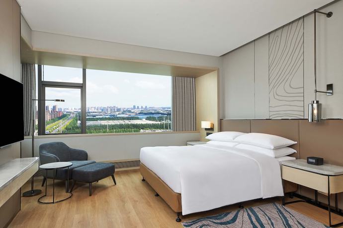 Imagen de la habitación del Hotel Courtyard by Marriott Changchun. Foto 12